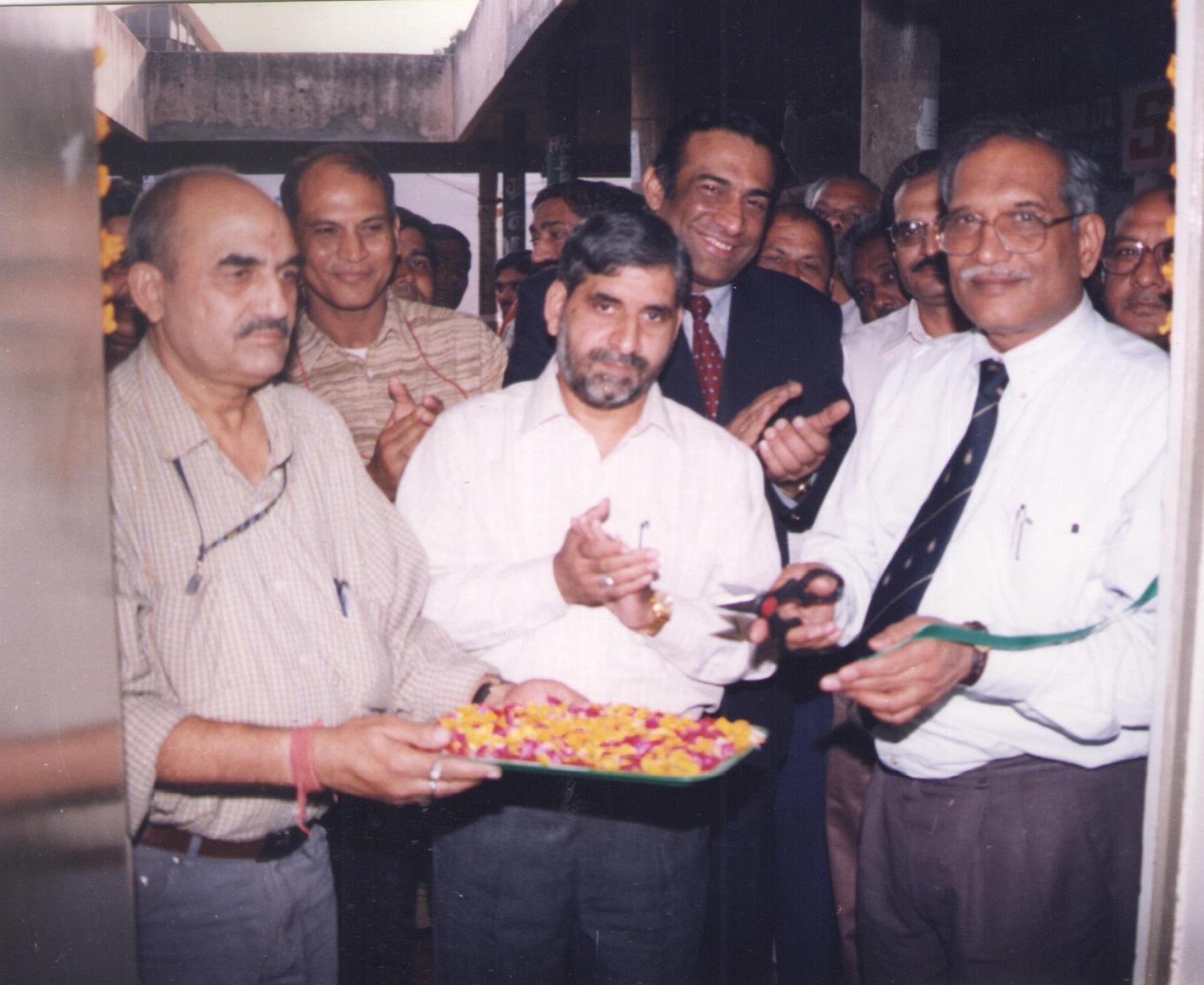 Photograph of former chairman with various dignatories