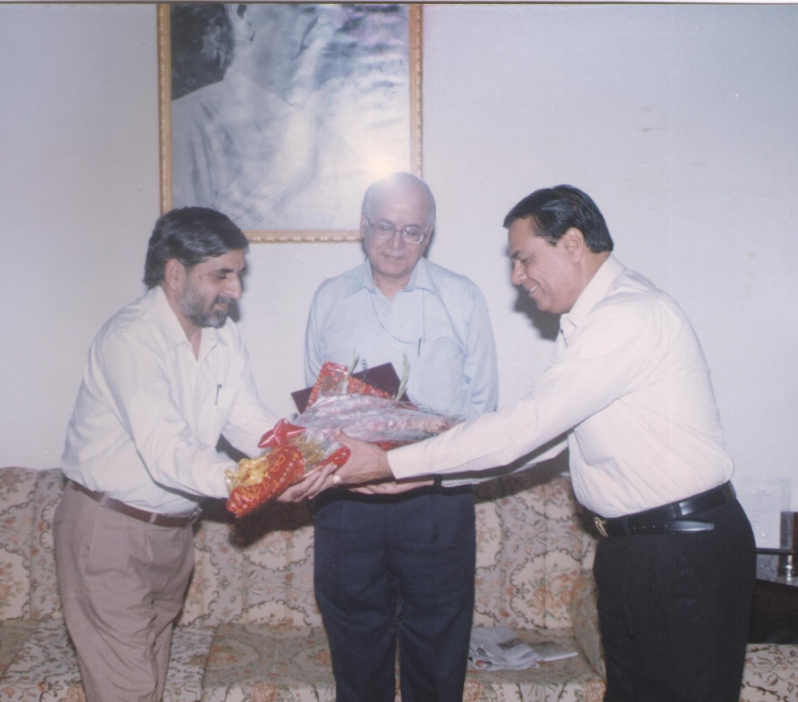 Photograph of former chairman with various dignatories