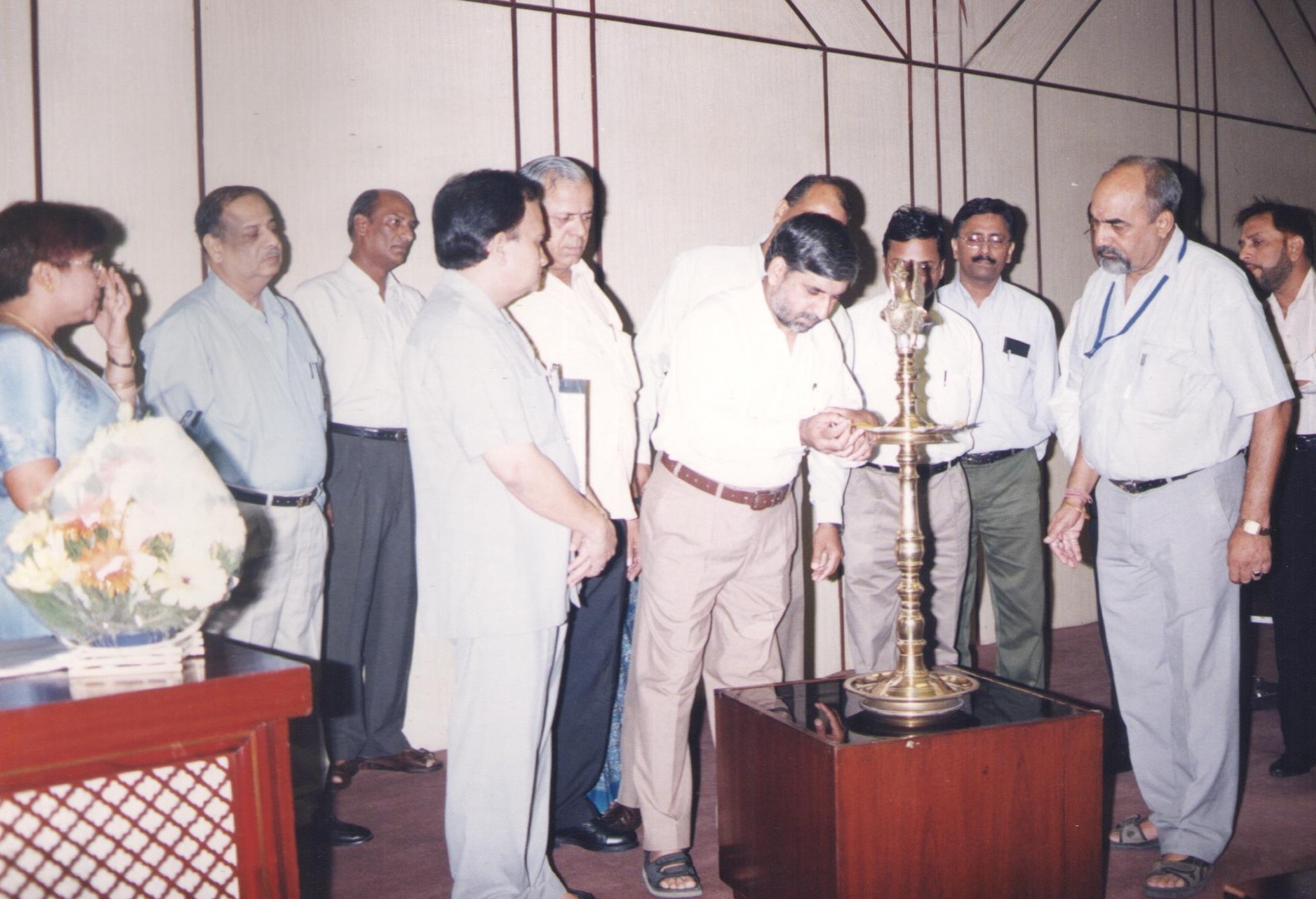 Photograph of former chairman with various dignatories