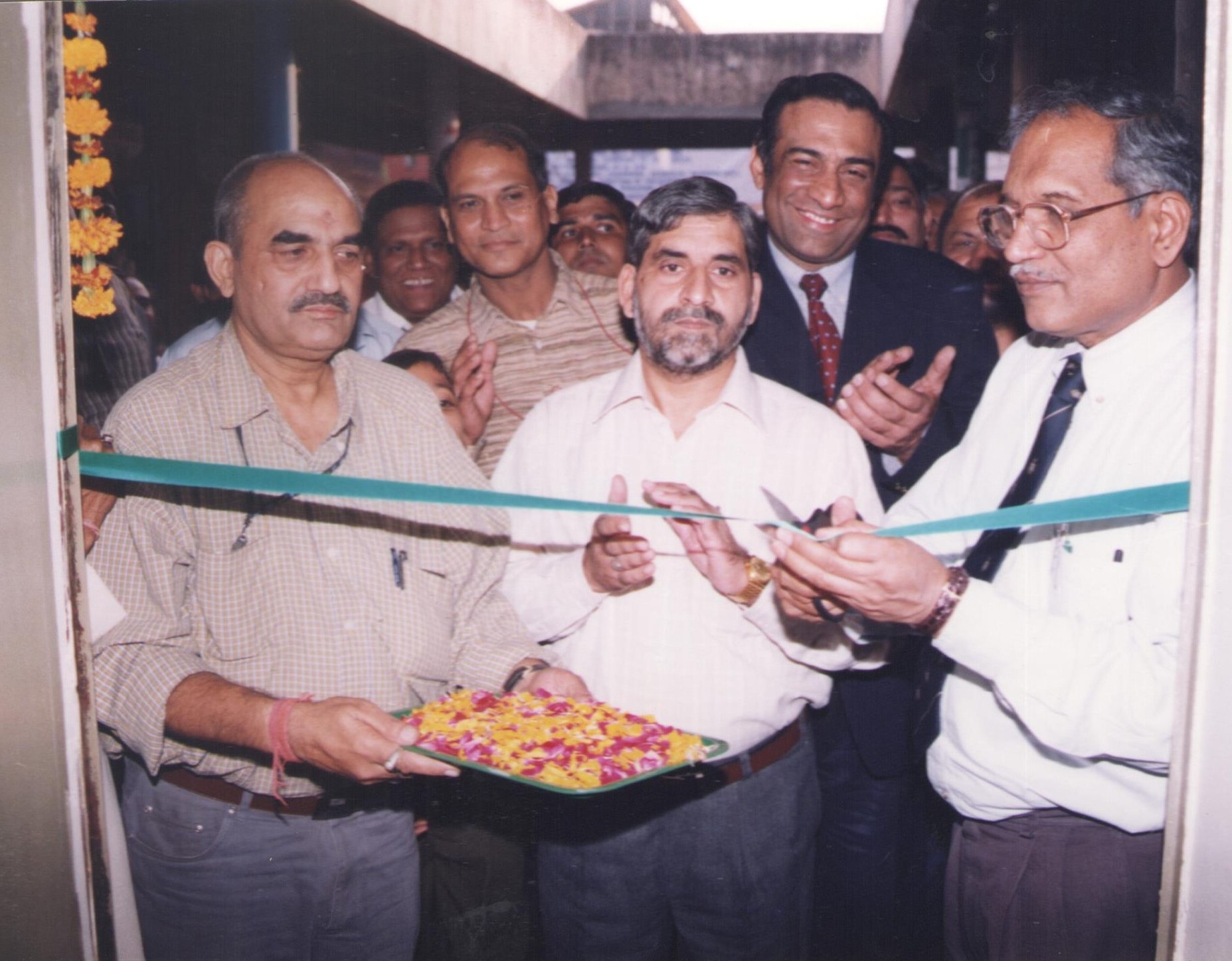 Photograph of former chairman with various dignatories